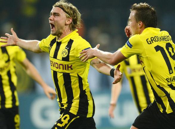  哈兰德戴帽助多特大胜法兰克福  